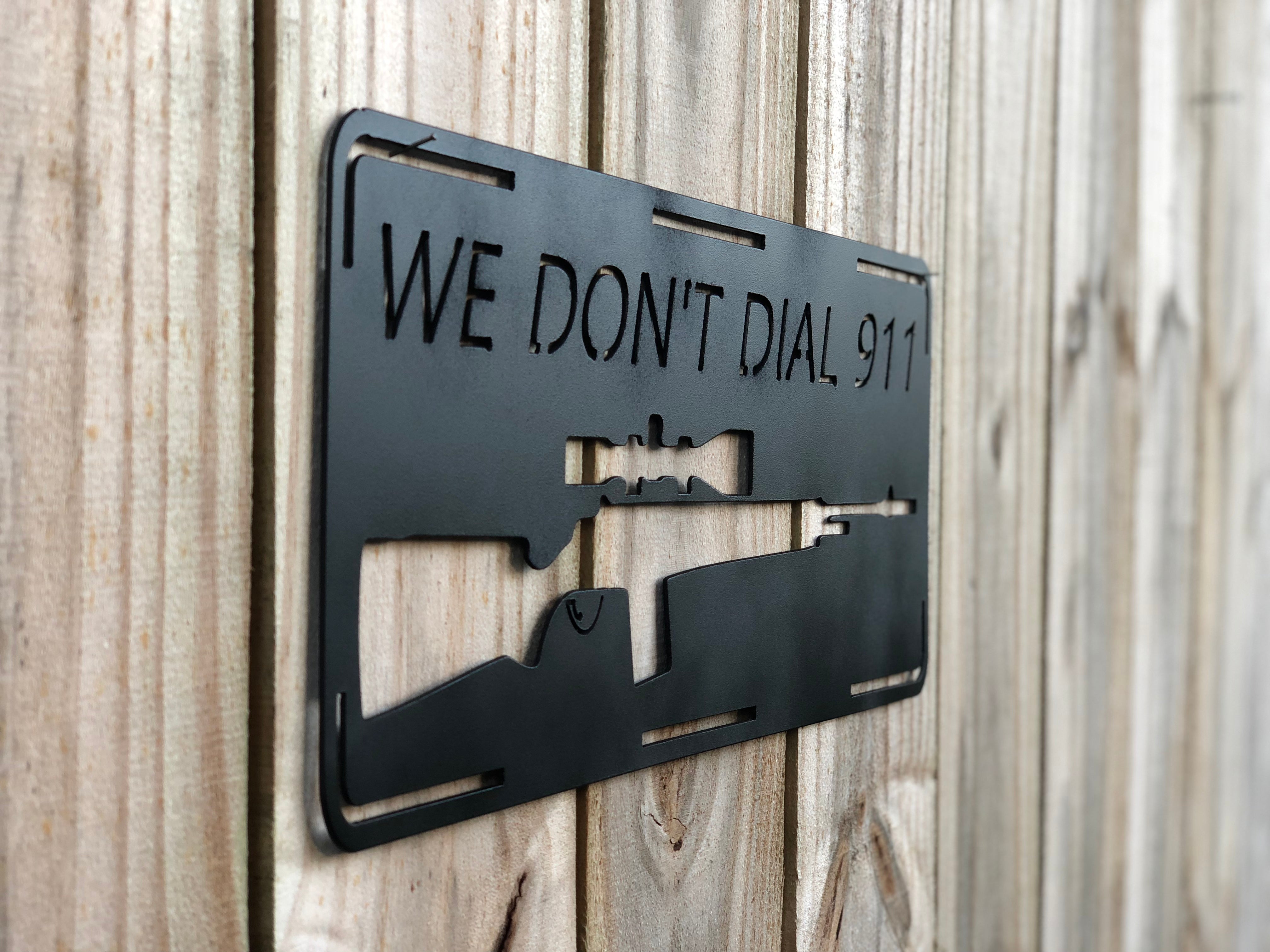 We Don't Dial 911 Sign