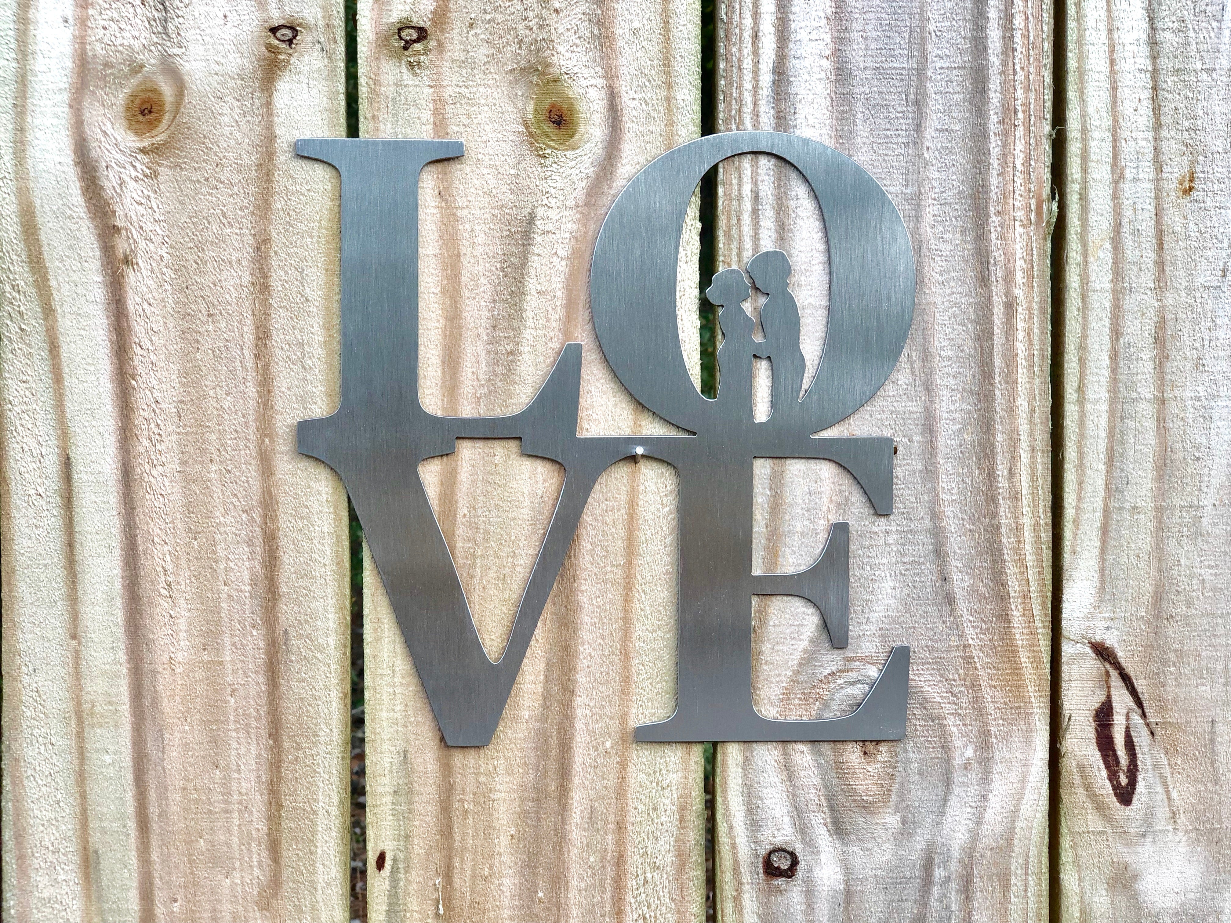 love sign with couple