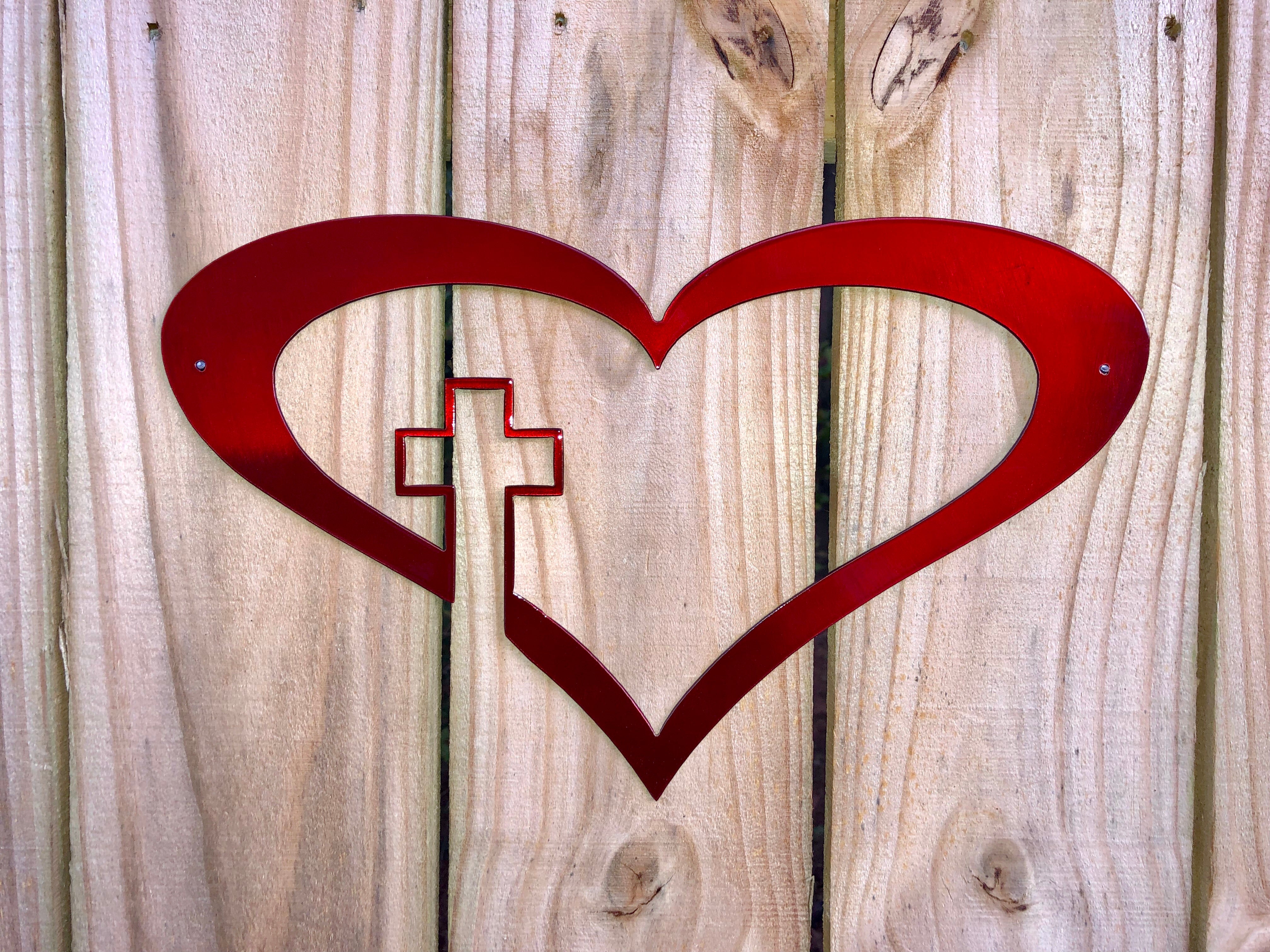 heart with cross metal sign